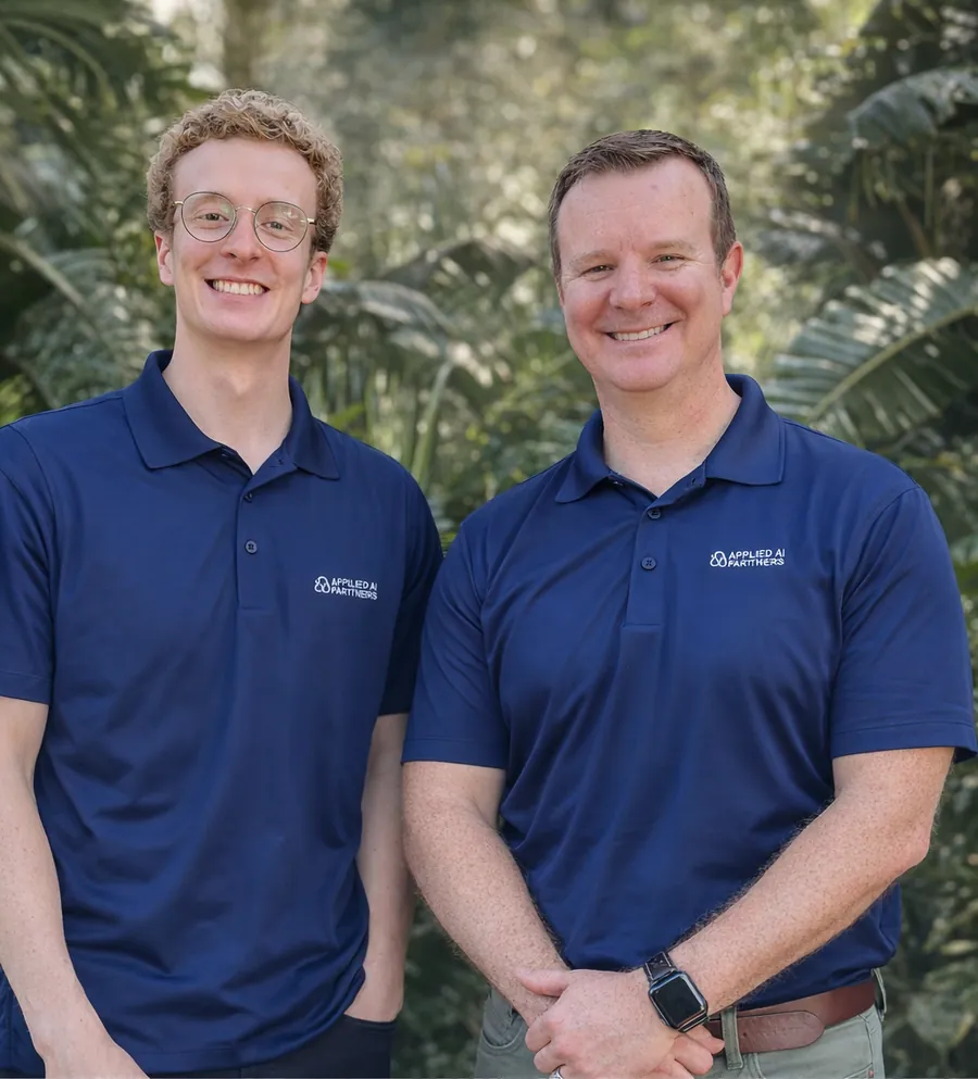 Applied AI Partners co-founders Nate Marks (left) and John Marks (right), brothers, in Applied AI Partners polos